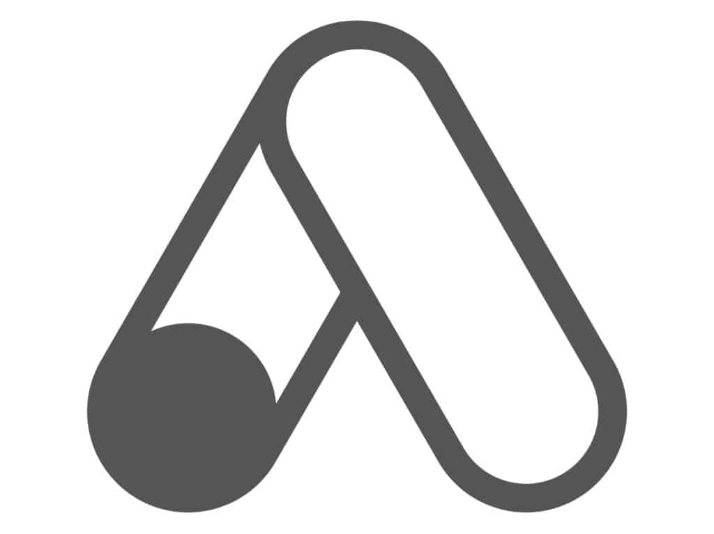 Symbole A stylisé : Logo graphique minimaliste gris Logo minimaliste gris formant un A stylisé. La branche gauche est une ligne courbe épaisse se terminant par un cercle plein, la branche droite est rectiligne.